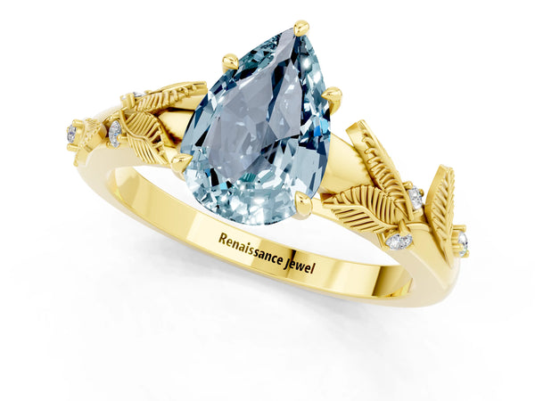 Yellow gold Pear Cut Aquamarine Solitaire Ring with Leaf Motif Band and Four-Prong Setting