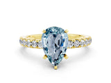 Yellow gold Pear Cut Aquamarine Solitaire Ring with Pavé Accents and Four-Prong Setting