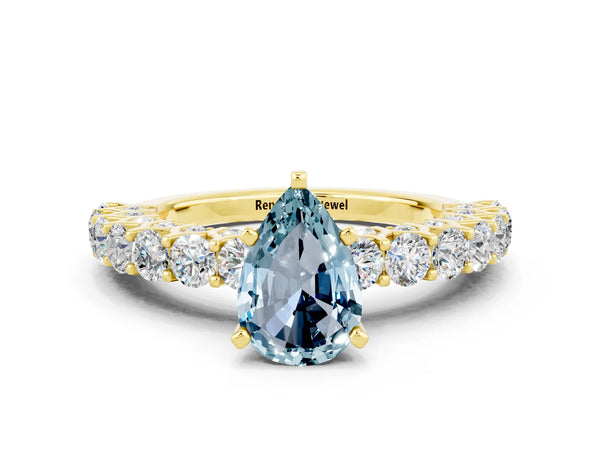 Yellow gold Pear Cut Aquamarine Solitaire Ring with Shared Prong Pavé Band and Four-Prong Setting