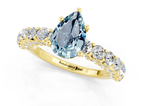 Yellow gold Pear Cut Aquamarine Solitaire Ring with Shared Prong Pavé Band and Four-Prong Setting_1
