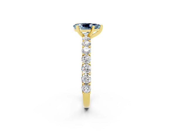 Yellow gold Pear Cut Aquamarine Solitaire Ring with Shared Prong Pavé Band and Four-Prong Setting