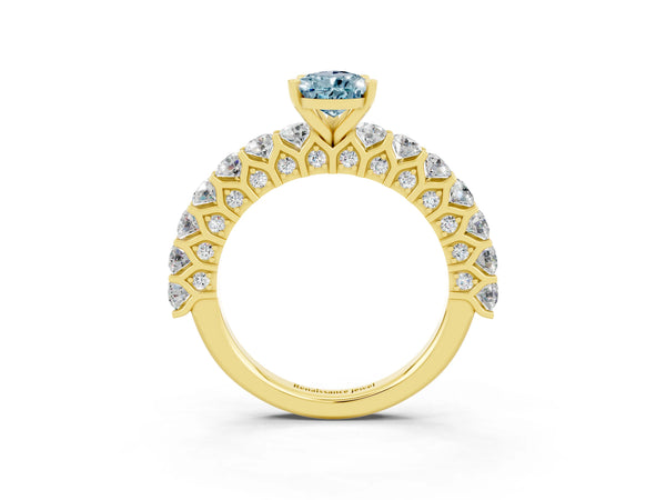 Yellow gold Pear Cut Aquamarine Solitaire Ring with Shared Prong Pavé Band and Four-Prong Setting