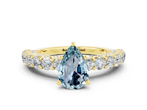 Yellow gold Pear Cut Aquamarine Solitaire Ring with Shared Prong Pavé Band and Four-Prong Setting