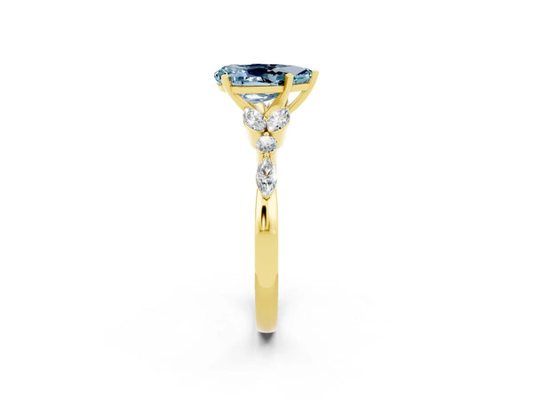 Yellow gold Pear Cut Aquamarine Solitaire Ring with Side Stones and Four-Prong Setting