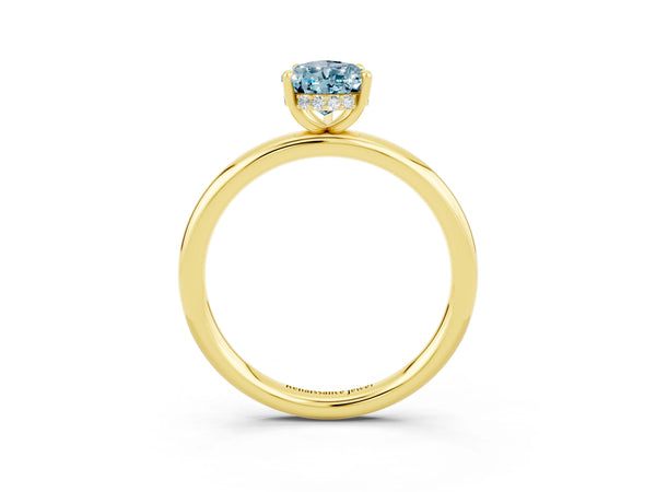 Yellow gold Pear Cut Aquamarine Solitaire Ring with Thin Band and Four-Prong Setting