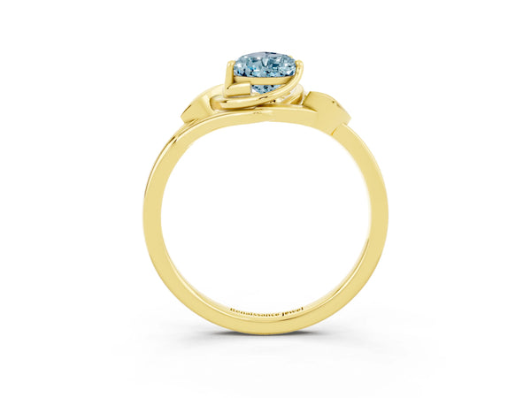 Yellow gold Pear Cut Aquamarine Solitaire Ring with Twist Band and Four-Prong Setting