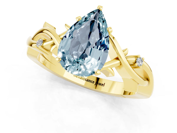 Yellow gold Pear Cut Aquamarine Solitaire Ring with Twisted Band and Prong Setting