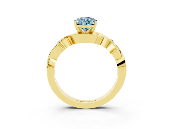 Yellow gold Pear Cut Aquamarine Solitaire Ring with Twisted Band and Prong Setting
