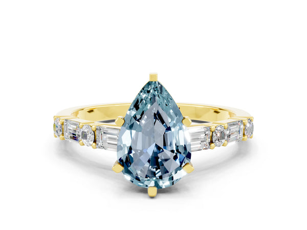 Yellow gold Pear Cut Aquamarine Solitaire with Side Baguettes and Channel Set Band