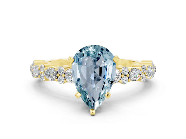 Yellow gold Pear Cut Aquamarine Side Stone Solitaire Ring with Round  and Four-Prong Setting