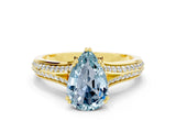Yellow gold Pear Cut Aquamarine Split Shank Engagement Ring with Pavé Band