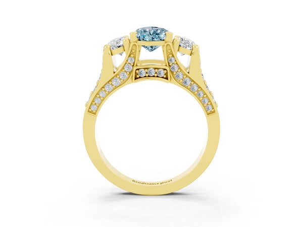 Yellow gold Pear Cut Aquamarine Three-Stone Ring with Channel Set Band and Four-Prong Setting