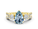 Yellow gold Pear Cut Aquamarine Three-Stone Ring with Pavé Split Shank and Four-Prong Setting_12