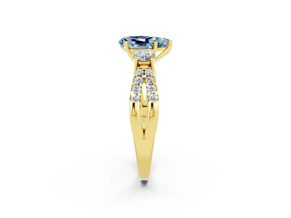 Yellow gold Pear Cut Aquamarine Three-Stone Ring with Pavé Split Shank and Four-Prong Setting