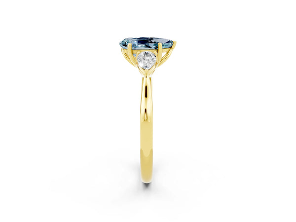 Yellow gold Pear Cut Aquamarine Three-Stone Ring with Pear  Side Stones and Prong Setting