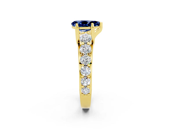 Yellow gold Pear Cut Blue Sapphire Engagement Ring with Pavé Band and Four-Prong Setting