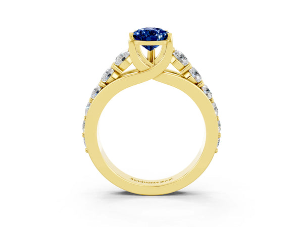 Yellow gold Pear Cut Blue Sapphire Engagement Ring with Pavé Band and Four-Prong Setting