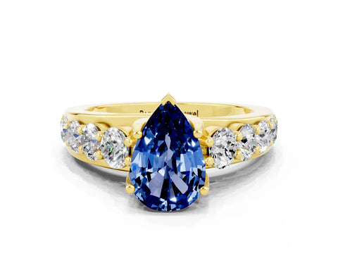 Yellow gold Pear Cut Blue Sapphire Engagement Ring with Pavé Band and Four-Prong Setting