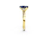 Yellow gold Pear Cut Blue Sapphire Engagement Ring with Side Stone Accents and Four-Prong Setting_29