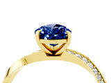 Yellow gold Pear Cut Blue Sapphire Engagement Ring with Side Stone Accents and Four-Prong Setting_64
