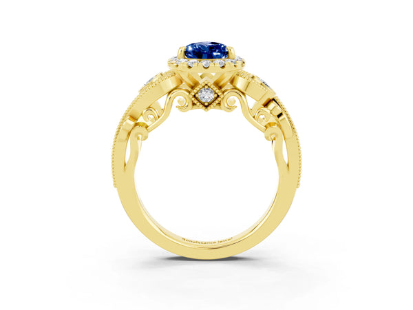 Yellow gold Pear Cut Blue Sapphire Halo Ring with Milgrain Pavé Band and Four-Prong Setting