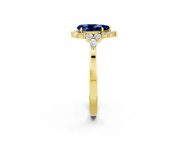 Yellow gold Pear Cut Blue Sapphire Halo Ring with Pear Side Stones and Prong Setting