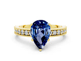 Yellow gold Pear Cut Blue Sapphire Milgrain Pavé Engagement Ring with Four-Prong Setting