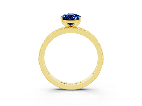 Yellow gold Pear Cut Blue Sapphire Milgrain Pavé Engagement Ring with Four-Prong Setting