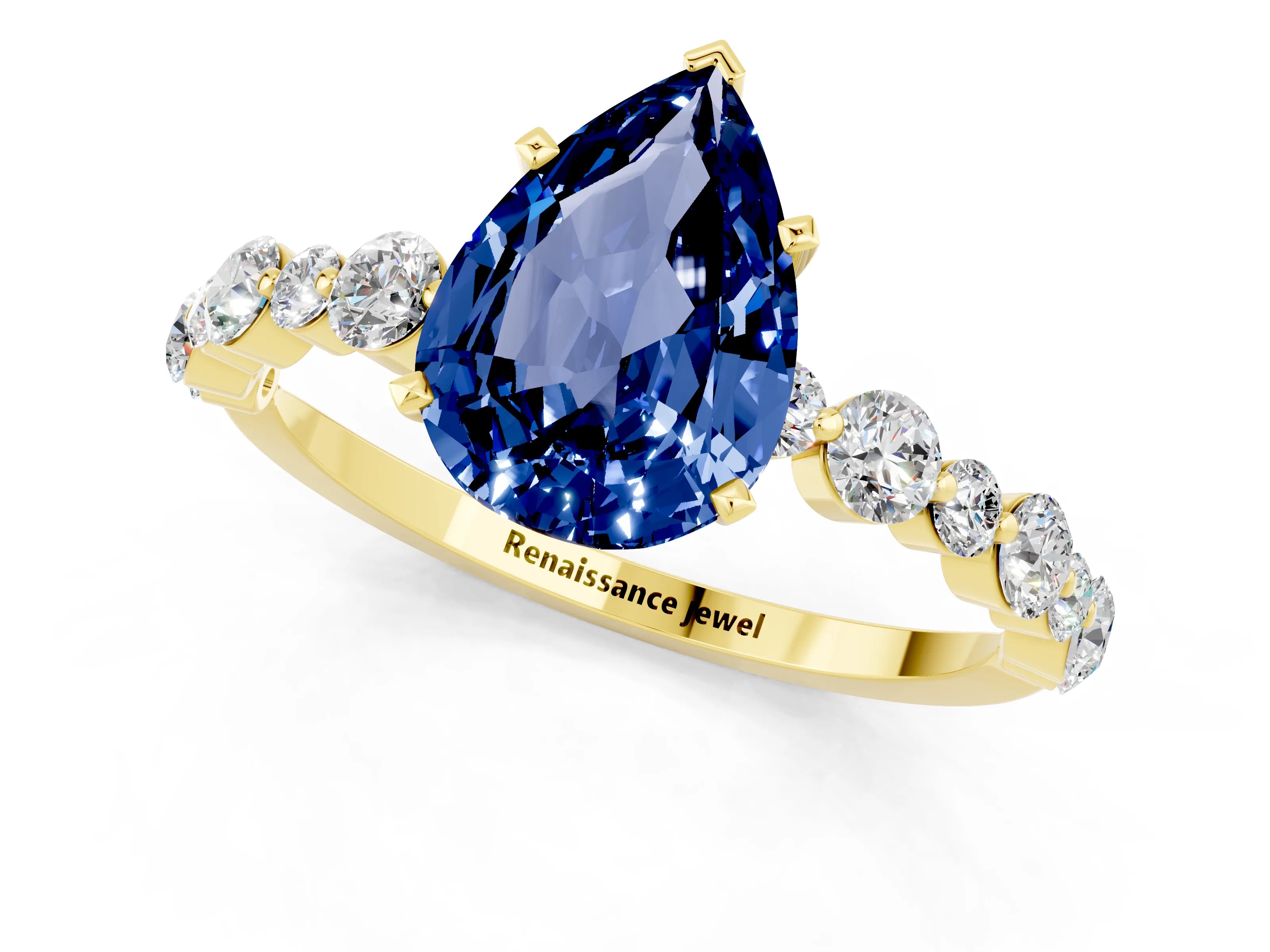 Yellow gold Pear Cut Blue Sapphire Prong Set Engagement Ring with Pavé Band_1
