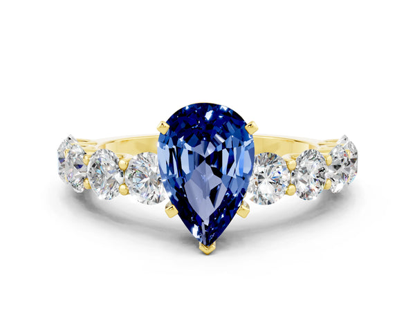 Yellow gold Pear Cut Blue Sapphire Prong Setting with Side Stones on a Pave Band