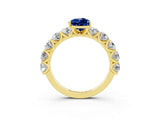 Yellow gold Pear Cut Blue Sapphire Prong Setting with Side Stones on a Pave Band_3