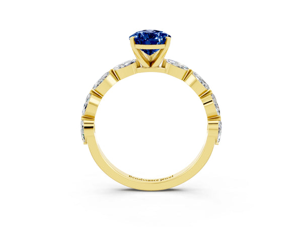 Yellow gold Pear Cut Blue Sapphire Ring with Marquise Side Stones and Prong Setting