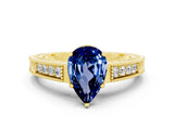 Yellow gold Pear Cut Blue Sapphire Ring with Milgrain Pavé Band and Four-Prong Setting_12