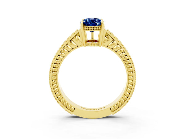 Yellow gold Pear Cut Blue Sapphire Ring with Milgrain Pavé Band and Four-Prong Setting