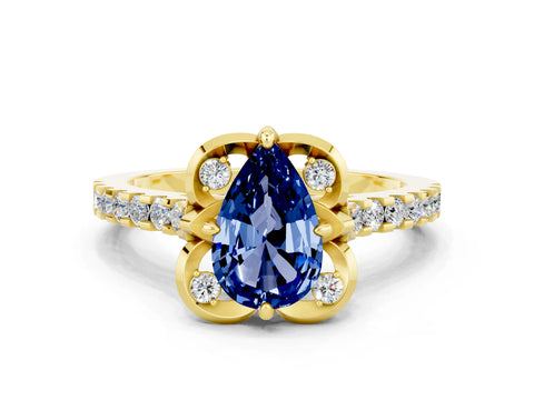 Yellow gold Pear Cut Blue Sapphire Ring with Pavé Band and Floral Prong Setting