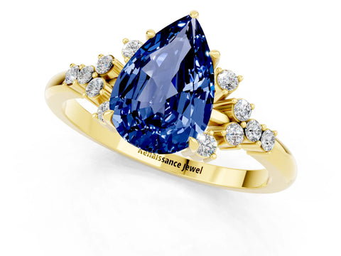 Yellow gold Pear Cut Blue Sapphire Ring with Side Stones and Four-Prong Setting_37