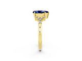 Yellow gold Pear Cut Blue Sapphire Ring with Side Stones and Four-Prong Setting_38