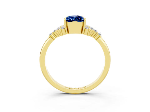 Yellow gold Pear Cut Blue Sapphire Ring with Side Stones and Four-Prong Setting_39