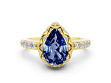 Yellow gold Pear Cut Blue Sapphire Scalloped Halo Engagement Ring with Round Shared Prong Band_24