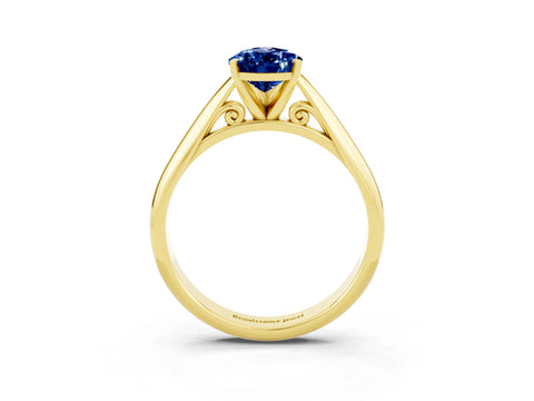 Yellow gold Pear Cut Blue Sapphire Solitaire Engagement Ring with Cathedral Setting and Four-Prong Mount_15