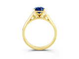 Yellow gold Pear Cut Blue Sapphire Solitaire Engagement Ring with Cathedral Setting and Four-Prong Mount_21