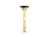 Yellow gold Pear Cut Blue Sapphire Solitaire Engagement Ring with Cathedral Setting and Four-Prong Mount_26