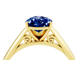 Yellow gold Pear Cut Blue Sapphire Solitaire Engagement Ring with Cathedral Setting and Four-Prong Mount_28