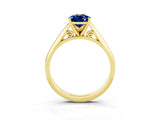Yellow gold Pear Cut Blue Sapphire Solitaire Engagement Ring with Cathedral Setting and Four-Prong Mount_81