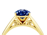 Yellow gold Pear Cut Blue Sapphire Solitaire Engagement Ring with Cathedral Setting and Four-Prong Mount_82