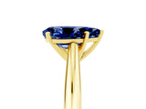 Yellow gold Pear Cut Blue Sapphire Solitaire Engagement Ring with Cathedral Setting and Four-Prong Mount_83