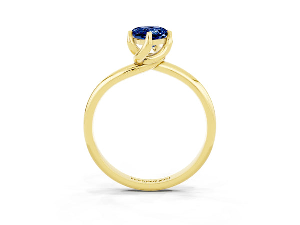 Yellow gold Pear Cut Blue Sapphire Solitaire Engagement Ring with Four-Prong Setting and Classic Band