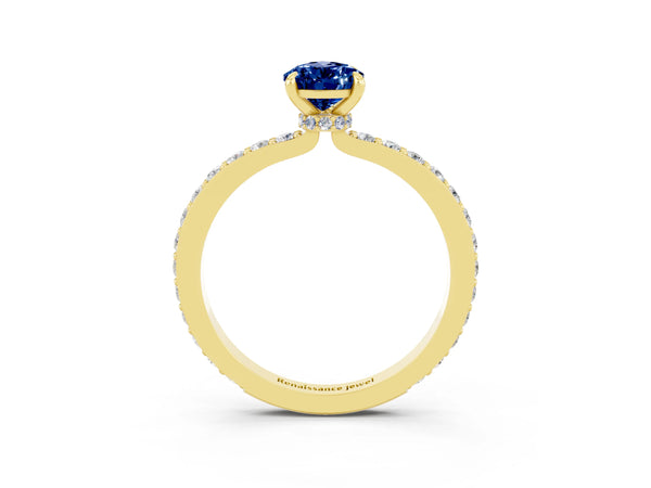 Yellow gold Pear Cut Blue Sapphire Solitaire Engagement Ring with Pavé Band and Four-Prong Setting
