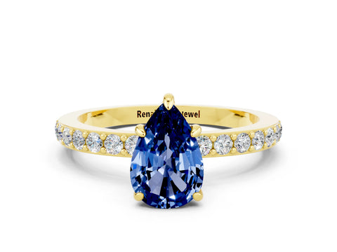 Yellow gold Pear Cut Blue Sapphire Solitaire Engagement Ring with Pavé Band and Four-Prong Setting