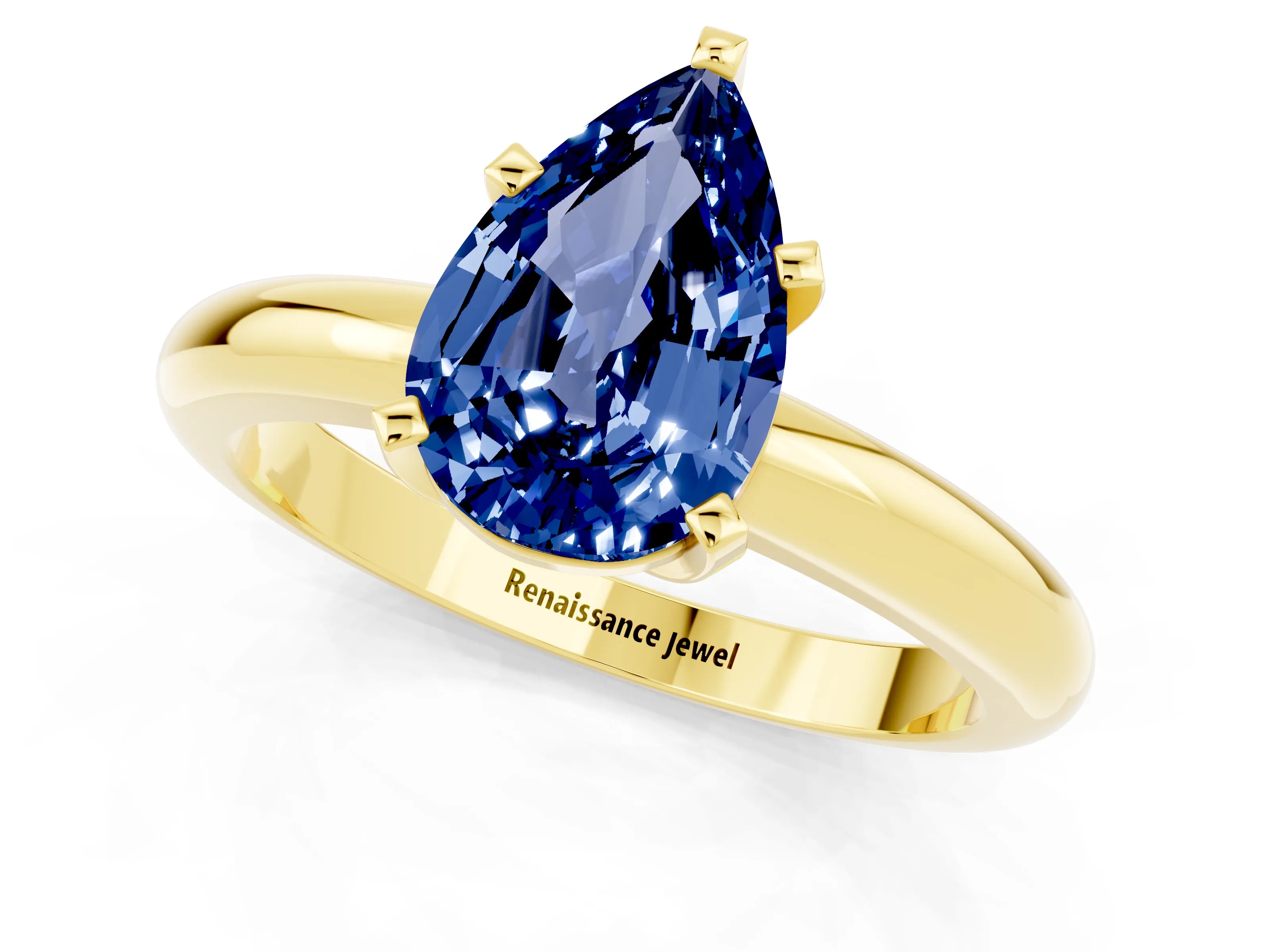 Yellow gold Pear Cut Blue Sapphire Solitaire Engagement Ring with Round Band and Four-Prong Setting_1